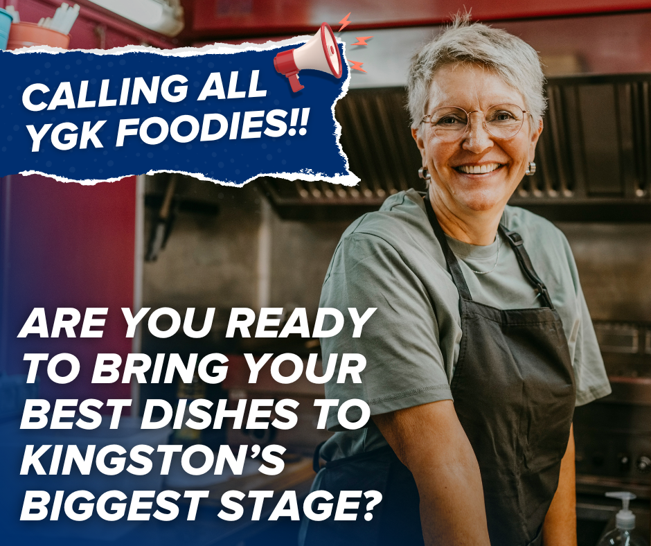 A white elder woman chef in a commercial kitchen.